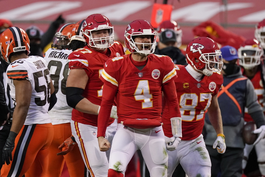 Kansas City Chiefs quarterback Chad Henne celebrates after a run during the second half of an NFL divisional round football game against the Cleveland Browns, Sunday, Jan. 17, 2021, in Kansas City.