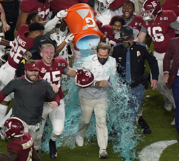 Alabama senior Thomas Fletcher (45) celebrates as head coach Nick Saban is soaked in Gatorade after their win against Ohio State in the College Football Playoff national championship game Jan. 11 in Miami Gardens, Fla. Fletcher, whose 55 career starts were the most on Alabama, was named the winner of the Patrick Mannelly Award, given to the nation&#039;s top collegiate long snapper.