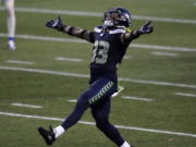 Seattle Seahawks strong safety Jamal Adams (33) reacts to a play against the Los Angeles Rams .