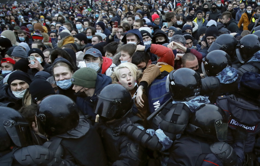People clash with police during a protest against the jailing of opposition leader Alexei Navalny in St.Petersburg, Russia, Saturday, Jan. 23, 2021. Russian police on Saturday arrested hundreds of protesters who took to the streets in temperatures as low as minus-50 C (minus-58 F) to demand the release of Alexei Navalny, the country&#039;s top opposition figure. A Navalny, President Vladimir Putin&#039;s most prominent foe, was arrested on Jan. 17 when he returned to Moscow from Germany, where he had spent five months recovering from a severe nerve-agent poisoning that he blames on the Kremlin.