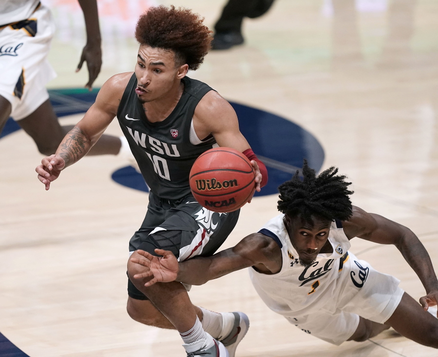 Washington State guard Isaac Bonton (10) is fouled by California guard Joel Brown (1) during the second half of an NCAA college basketball game Thursday, Jan. 7, 2021, in Berkeley, Calif.