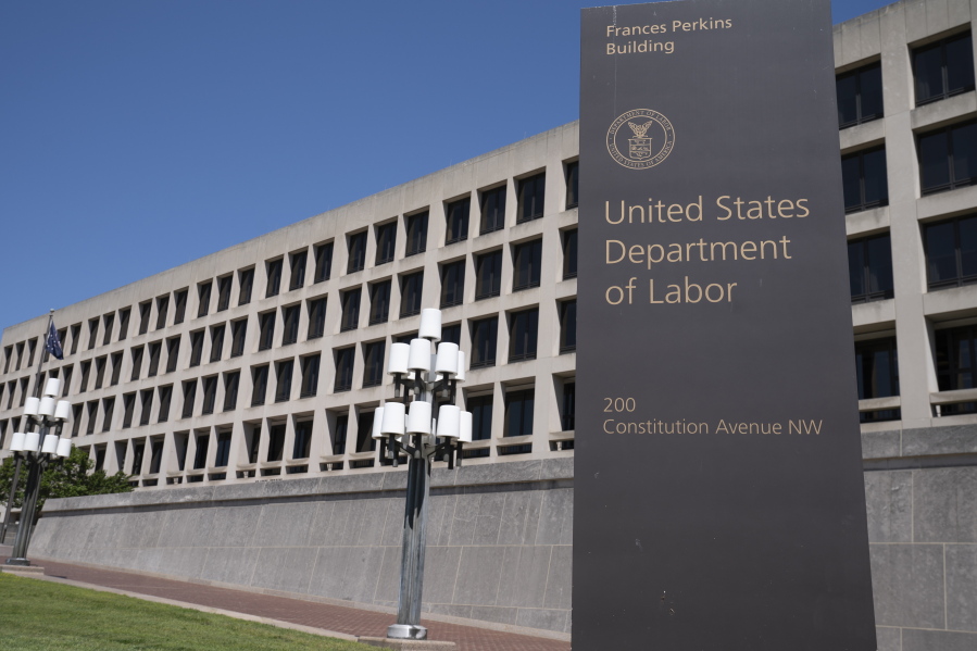 FILE - The entrance to the Labor Department is seen near the Capitol in Washington, Thursday, May 7, 2020.  Civil rights groups on Thursday, Jan. 21, 2021 celebrated President Joe Biden&#039;s swift revocation of a Trump administration order that had banned federal agencies, contractors and recipients of federal funding from conducting certain diversity training. The Department of Labor had already suspended enforcement of the order after a California federal court granted a preliminary injunction against it in response to a lawsuit filed by Lambda Legal, an organization that advocates for the rights of LGBT people. (AP Photo/J.