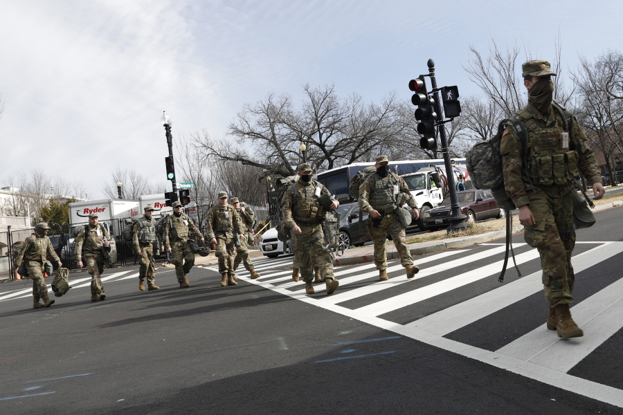 National Guard troops continue to be deployed around the Capitol one day after the inauguration of President Joe Biden, Thursday, Jan. 21, 2021, in Washington.