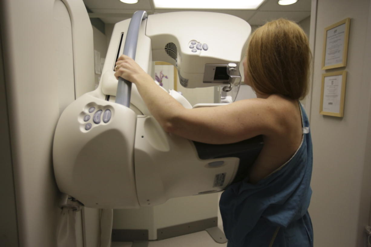 A woman gets a mammogram at the University of Michigan Cancer Center in Ann Arbor, Mich. (Kimberly P.