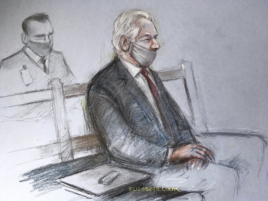 This is a court artist sketch by Elizabeth Cook of Julian Assange appearing at the Old Bailey in London for the ruling in his extradition case, in London, Monday, Jan. 4, 2021. A British judge has rejected the United States&#039; request to extradite WikiLeaks founder Julian Assange to face espionage charges, saying it would be &quot;oppressive&quot; because of his mental health. District Judge Vanessa Baraitser said Assange was likely to kill himself if sent to the U.S. The U.S. government said it would appeal the decision.