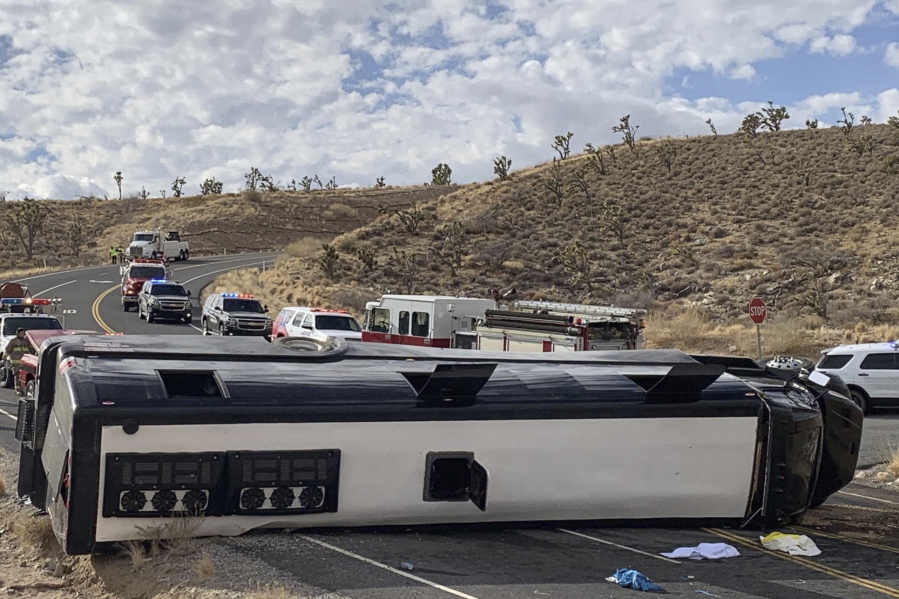 This photo provided by the Mohave County Sheriff&#039;s Office shows a Las Vegas-based tour that rolled over in northwestern Arizona on Friday, Jan. 22, 2021. One person died, and two were critically injured. The cause of the rollover is under investigation.