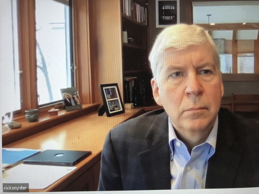 This screen shot from video, shows former Michigan Gov. Rick Snyder, during his Zoom hearing Tuesday, Jan. 18, 2020, in 67th District Court in Flint, Mich. Attorneys for Snyder are telling prosecutors that the Flint water case should be dismissed because he was charged in the wrong county. Snyder was charged last week with two misdemeanor counts of willful neglect of duty.
