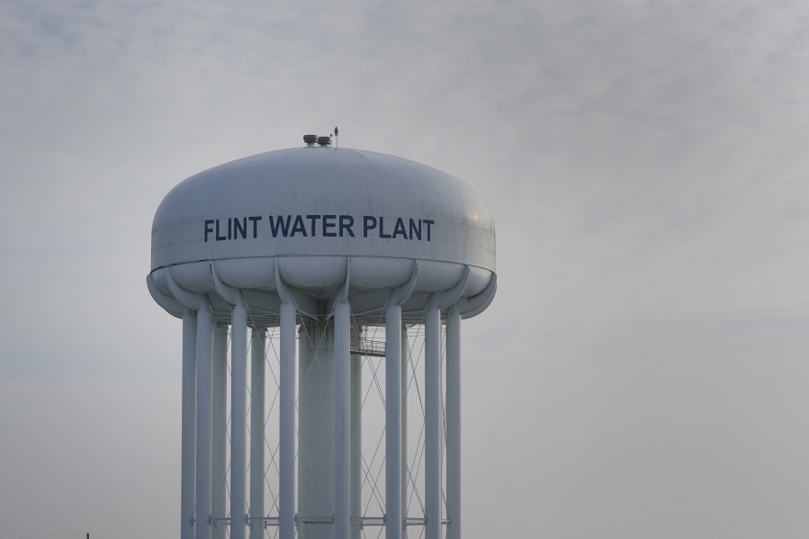 The Flint Water Plant tower is shown in Flint, Mich., Wednesday, Jan. 13, 2021.  Some Flint residents impacted by months of lead-tainted water are looking past expected charges against former Gov. Rick Snyder and others in his administration to healing physical and emotional damages left by the crisis.