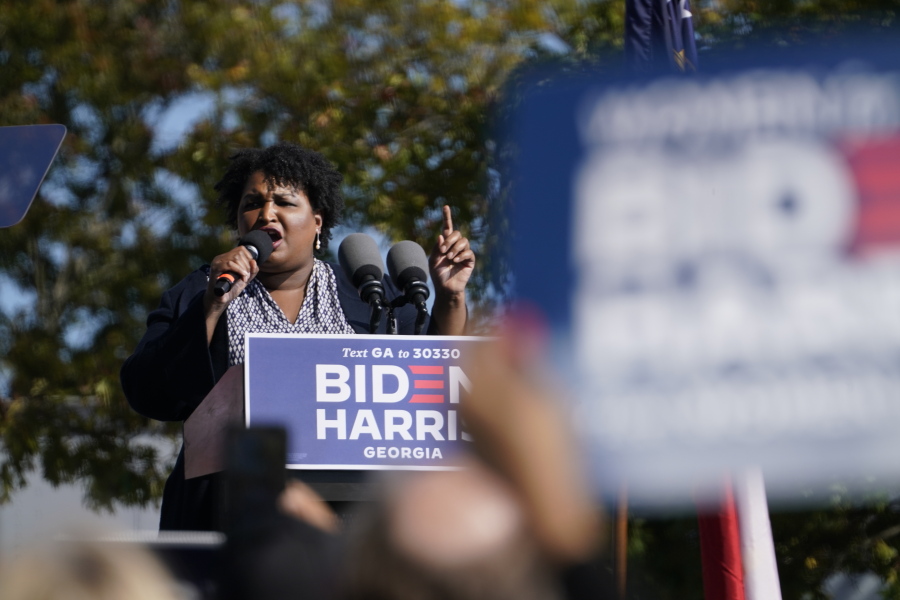 Stacey Abrams speaks to supporters as they wait Nov. 2 for former President Barack Obama to arrive and speak at a rally as he campaigns for Democratic presidential candidate former Vice President Joe Biden, at Turner Field in Atlanta.