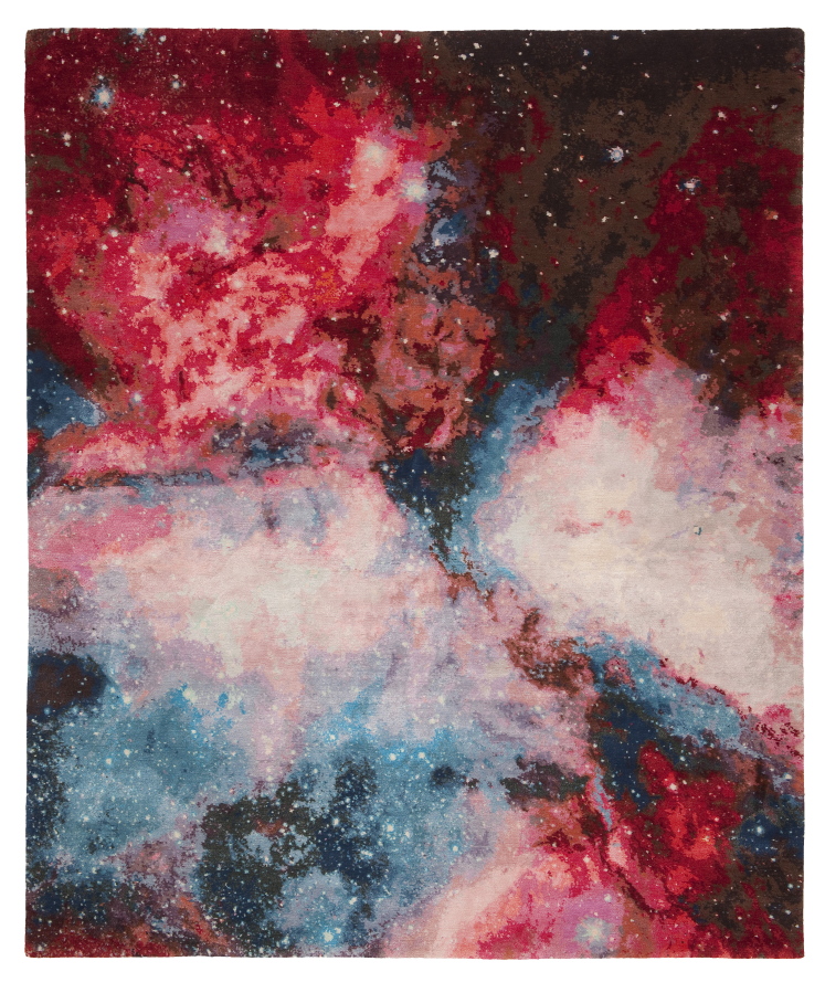 This image provided by Jan Kath Design GmbH shows an outer space themed rug. German designer Jan Kath has created a rug collection called Spacecrafted inspired by imagery of gas clouds and asteroid nebulae from the Hubble telescope.
