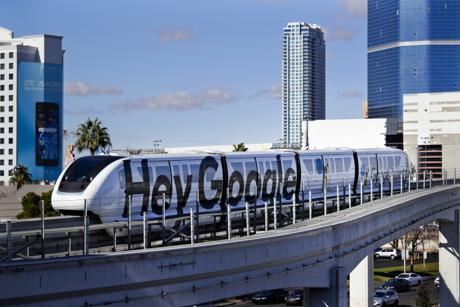 FILE - In this Jan. 10, 2018, file photo, a monorail with a Google advertisement passes the Las Vegas Convention Center during CES International in Las Vegas. The idled Las Vegas Monorail is being bought by the local tourism authority with plans to arrange the system&#039;s second Chapter 11 bankruptcy after 16 years of operation by a not-for-profit corporation.  (AP Photo/Jae C.