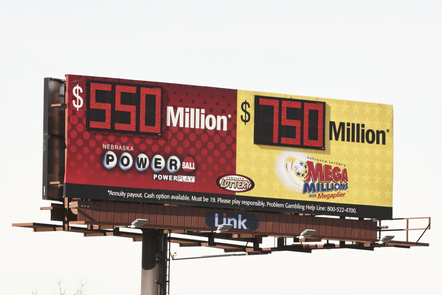 A billboard advertises the jackpots of the Powerball and Mega Millions lotteries, in Omaha, Neb., Wednesday, Jan. 13, 2021. Lottery players will have a shot Friday night at the fifth-largest jackpot in U.S. history after no tickets matched all the numbers in the latest Mega Millions drawing. The big prize for Powerball, the other national lottery game, is $550 million for Wednesday night&#039;s drawing.