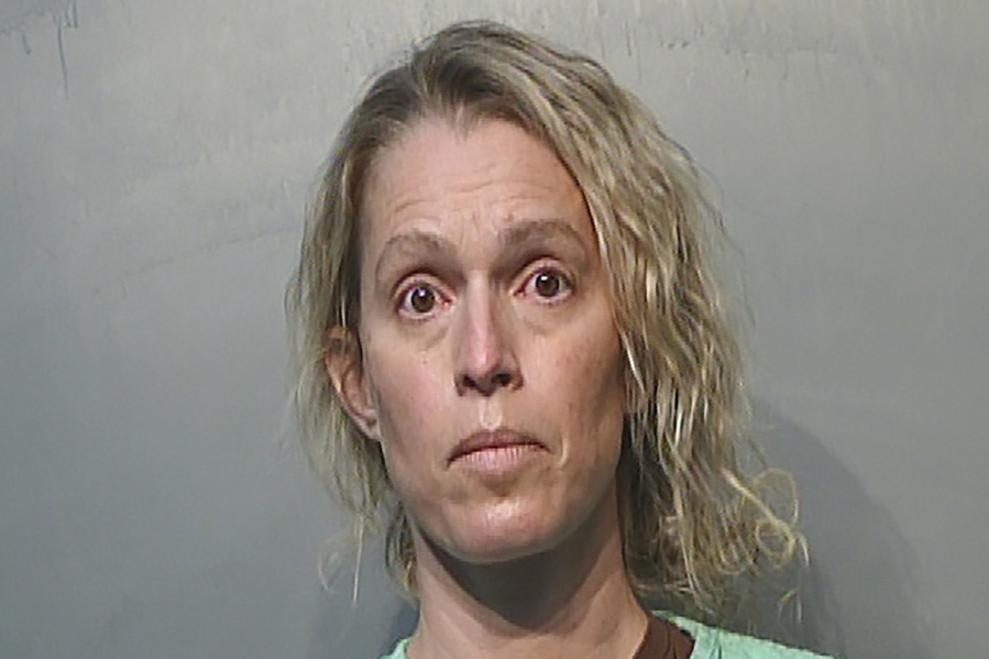 This Jan. 21, 2021, photo provided by the Polk County Jail in Des Moines, Iowa shows Jennifer Woodley. Former Make-A-Wish Iowa CEO Jennifer Woodley is charged with first-degree theft and unauthorized use of a credit card. The organization announced last summer that she had been terminated as CEO after it discovered financial irregularities during a compliance review.