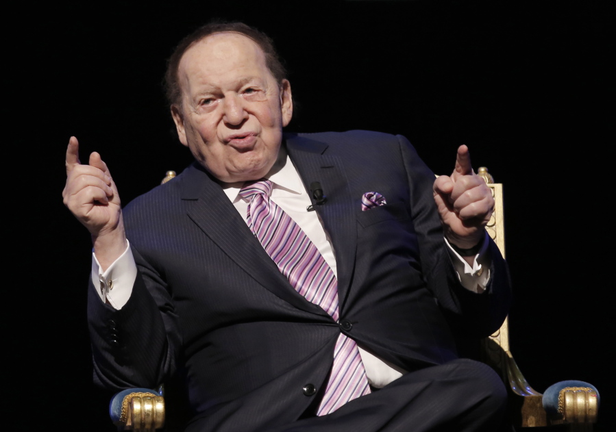 FILE - In this Sept. 13, 2016 file photo, U.S. billionaire Sheldon Adelson speaks during a news conference for the opening of Parisian Macao in Macau.  Adelson, the billionaire mogul and power broker who built a casino empire spanning from Las Vegas to China and became a singular force in domestic and international politics has died after a long illness.