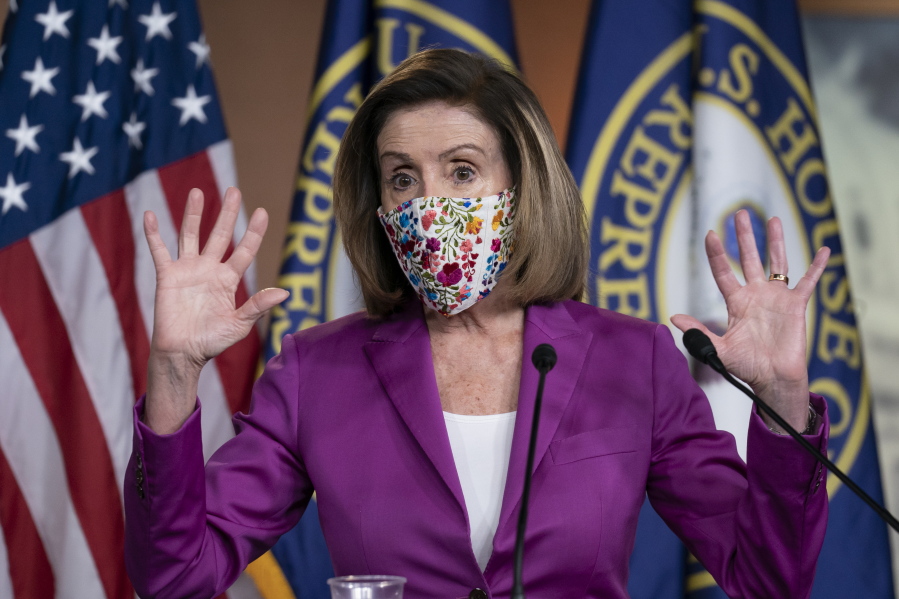 Speaker of the House Nancy Pelosi, D-Calif., holds a news conference on the day after violent protesters loyal to President Donald Trump stormed the U.S. Congress, at the Capitol in Washington, Thursday, Jan. 7, 2021. (AP Photo/J.