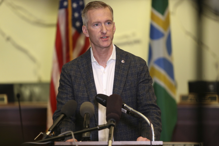 FILE - In this Aug. 30, 2020 file photo Portland Mayor Ted Wheeler speaks during a news conference. On Monday, Jan.