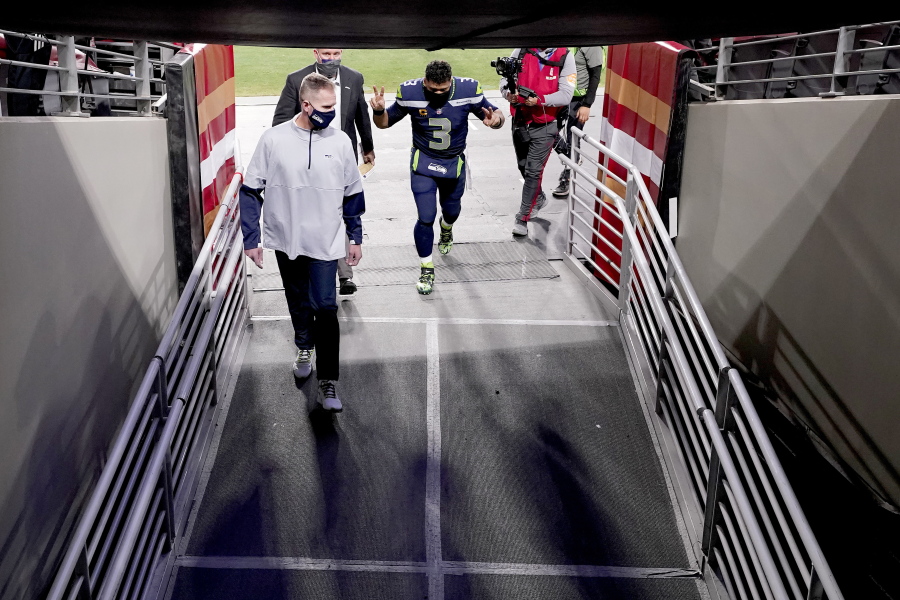 Seattle Seahawks quarterback Russell Wilson (3) leaves the field after a 26-23 win over the San Francisco 49ers. (Ross D.