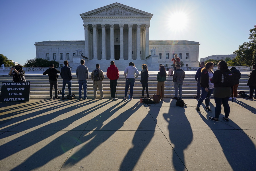 Anti-abortion activists with &quot;Bound 4 Life&quot; demonstrate at the Supreme Court in Washington, Monday, Oct. 5, 2020, as the justices begin a new term without the late Justice Ruth Bader Ginsburg. (AP Photo/J.
