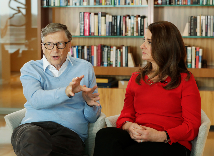 FILE - In this Feb. 1, 2018, file photo, Microsoft co-founder Bill Gates and his wife Melinda take part in an AP interview in Kirkland, Wash. Bill Gates is starting a new fight against systemic poverty in America, as his private foundation announces millions of dollars toward unspecified initiatives ranging from data projects to funding for community activists. (AP Photo/Ted S.