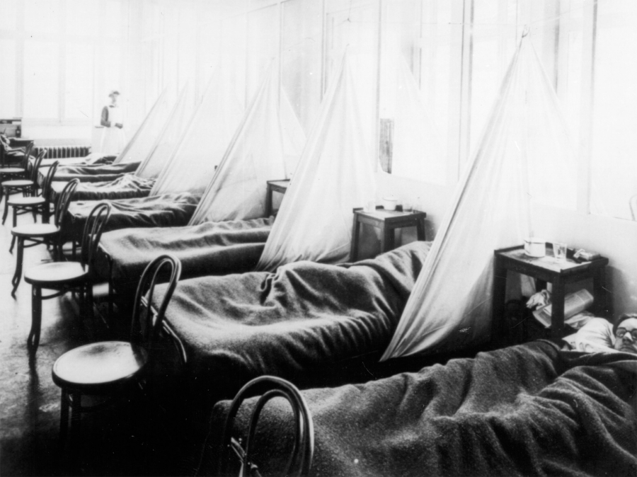 Influenza  patients lie on cots at the U.S. Army Camp Hospital #45, Aix-les-Bains, France during the 1918 Spanish influenza outbreak. Public health officials are so worried about a flu pandemic, like the 1918 killer of 20 million people worldwide, that they are preparing localized response plans just as they do for hurricanes and earthquakes.