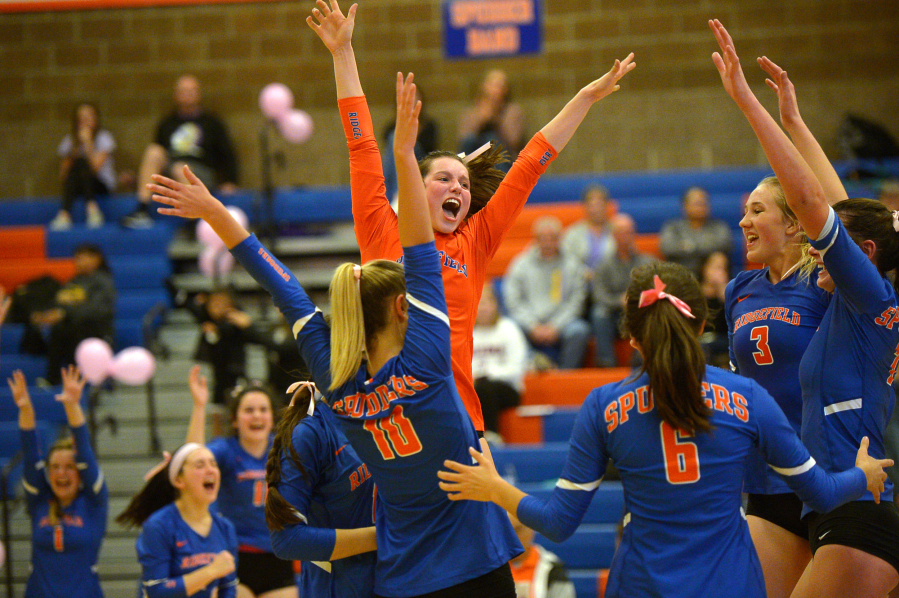 The Ridgefield volleyball team celebrates a win against Columbia River last season. The Spudders open their 2020-21 season at home Tuesday against Mark Morris.