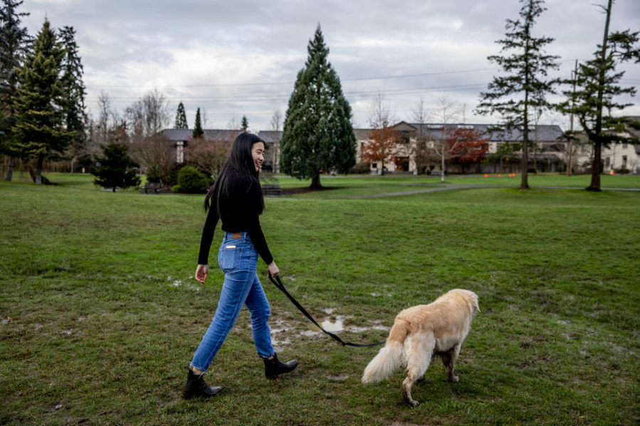 Novia Liu walks her dog, Snicker, at Medina Park on Feb. 5, 2020.