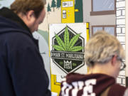 A poster for Main Street Marijuana is seen here on the dispensaryis wall in Vancouver on Tuesday afternoon, Feb. 4, 2020.