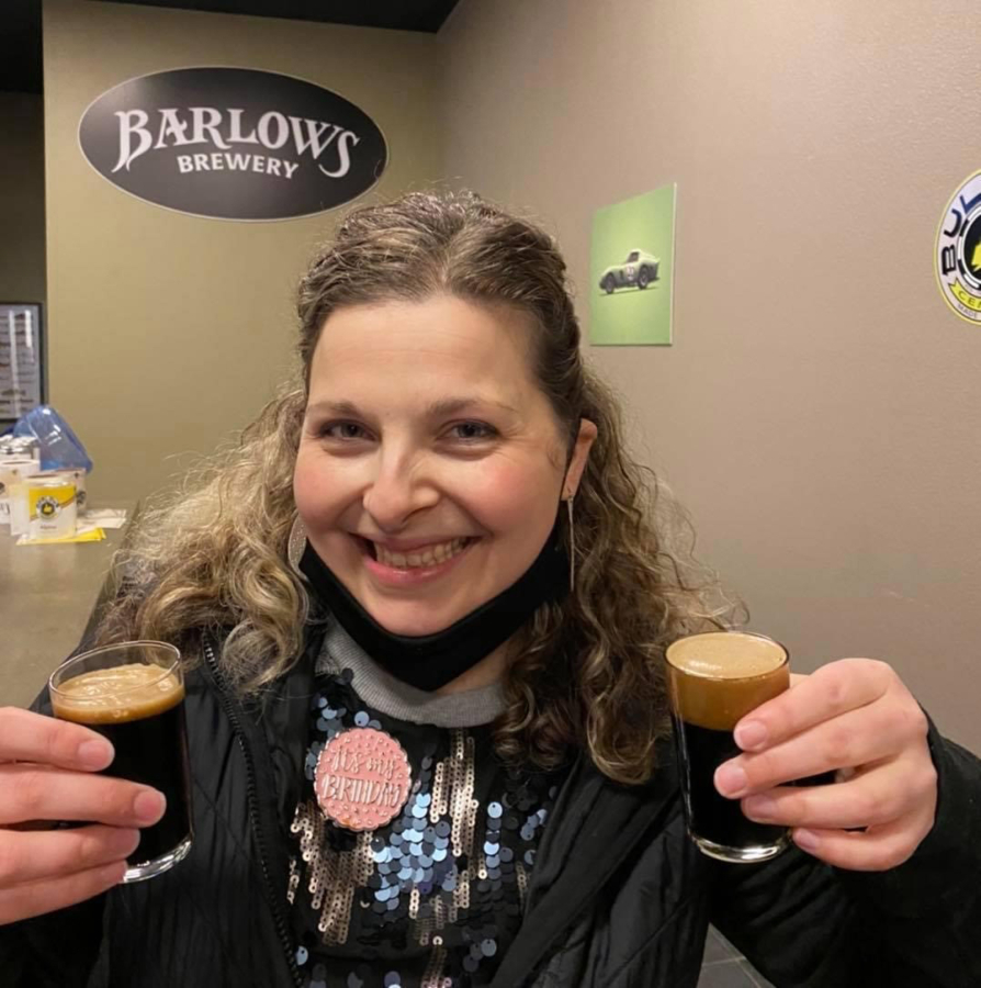 Bria Perozzo with two new dark beers at Barlows Brewery.