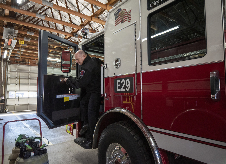 Clark-Cowlitz Fire Rescue Chief John Nohr steps out of a new fire truck Feb. 12, 2021, at Fire Station 26 in Dollars Corner.