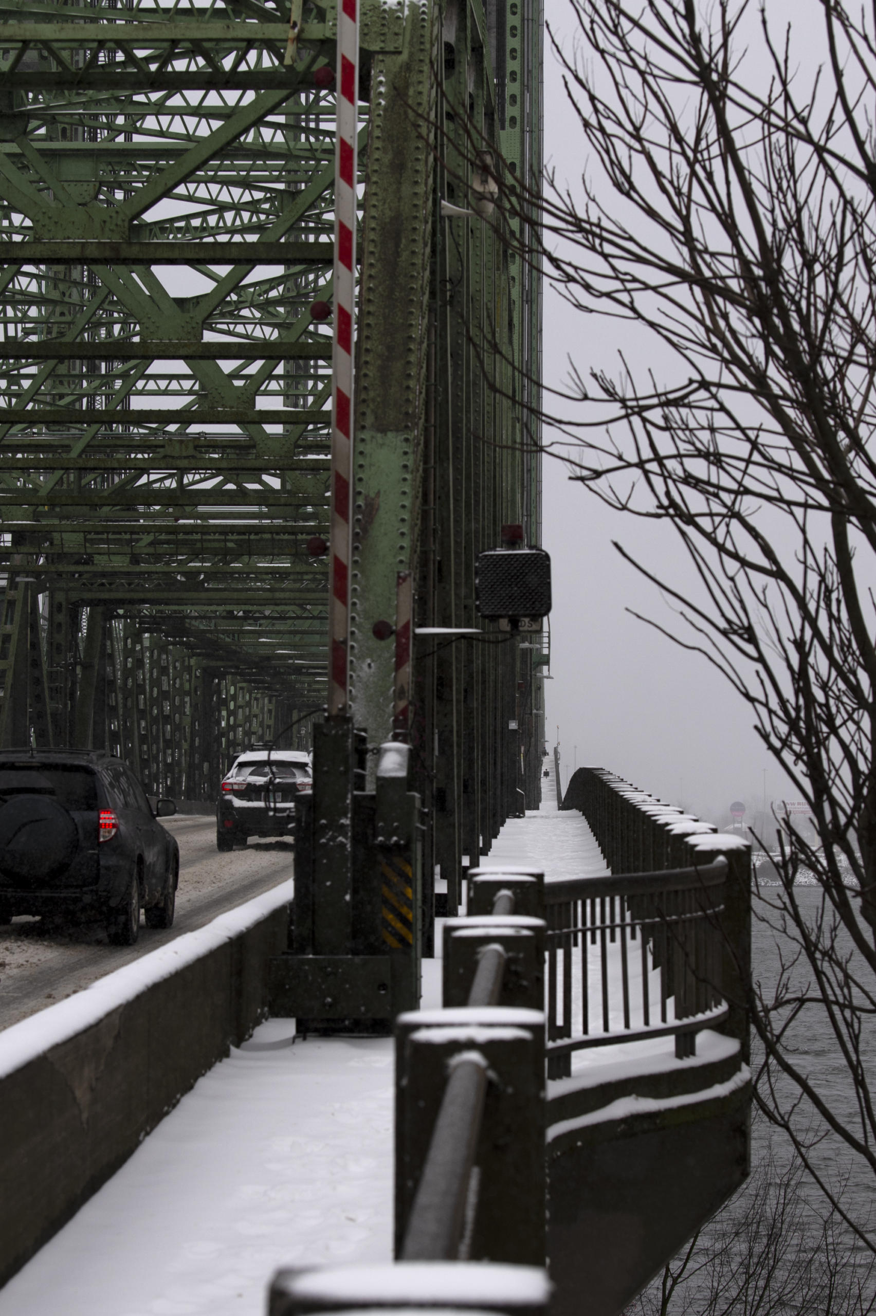A snow-lined pedestrian walkway on the Interstate 5 bridge pictured on Friday afternoon, February 12, in downtown Vancouver.
