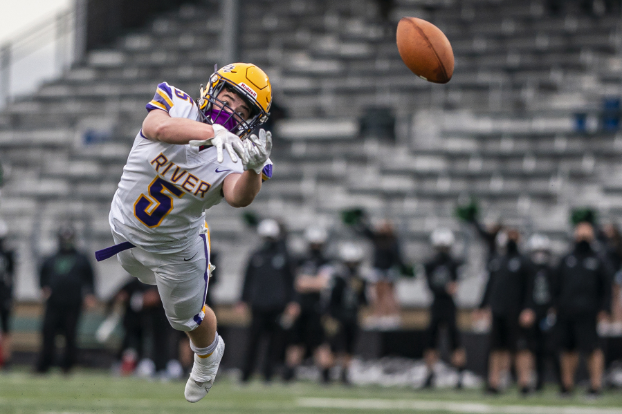 Columbia River&#039;s Max Sturtevant tried to make this catch at Woodland High School on Saturday. If he had, only players, coaches, game officials and a few dozen fans in the bleachers would have seen it in person.