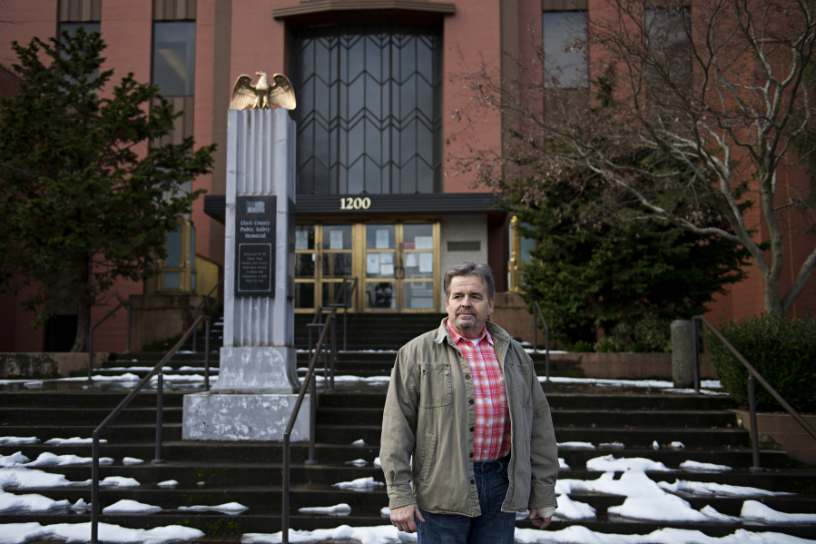 Ken Hines, a non-law enforcement member of the Southwest Washington Independent Investigative Response Team, pauses for a portrait outside the Clark County Courthouse. Hines, of Washougal, said when he was called to serve as a non-law enforcement member of the team investigating the police shooting of 23-year-old Irving Rodriguez, it offered a clearer glimpse into the workings of local law enforcement.