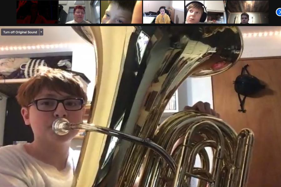 WASHOUGAL: The Jemtegaard Middle School Band, including eighth-grader Chance Wilson on tuba, helped Columbia River Gorge Elementary third-grade students understand concepts of sound and sound waves over Zoom.