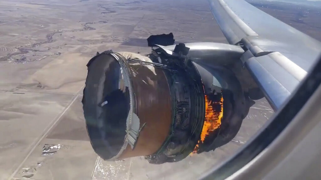 In this image taken from video, the engine of United Airlines Flight 328 is on fire after after experiencing "a right-engine failure" shortly after takeoff from Denver International Airport, Saturday, Feb. 20, 2021, in Denver, Colo. The flight landed safely and none of the passengers or crew onboard were hurt.
