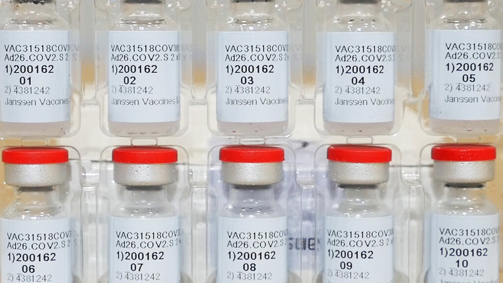 FILE - This Dec. 2, 2020 photo provided by Johnson &amp; Johnson shows vials of the Janssen COVID-19 vaccine in the United States.  Johnson &amp; Johnson’s single-dose vaccine protects against COVID-19, according to an analysis by U.S. regulators Wednesday, Feb. 24, 2021,  that sets the stage for a final decision on a new and easier-to-use shot to help tame the pandemic. The Food and Drug Administration’s scientists confirmed that overall, it's about 66% effective and also said J&amp;J's shot, one that could help speed vaccinations by requiring just one dose instead of two, is safe to use.