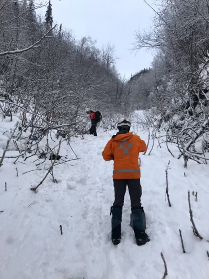 Two Alaska Mountain Rescue Group volunteers are shown Feb. 3 after an avalanche in the Bear Mountain area near Chugiak, Alaska.