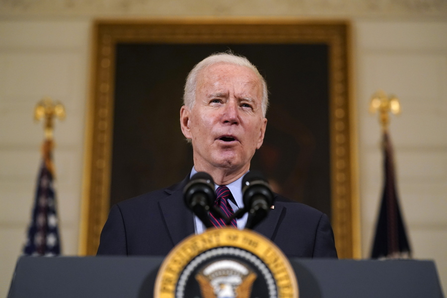 FILE - In this Friday, Feb. 5, 2021, file photo, President Joe Biden speaks in the State Dining Room of the White House, in Washington.