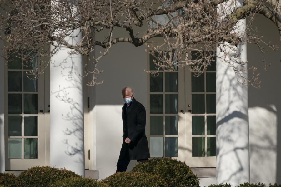 President Joe Biden walks to the Oval Office of the White House, Monday, Feb. 8, 2021, in Washington.