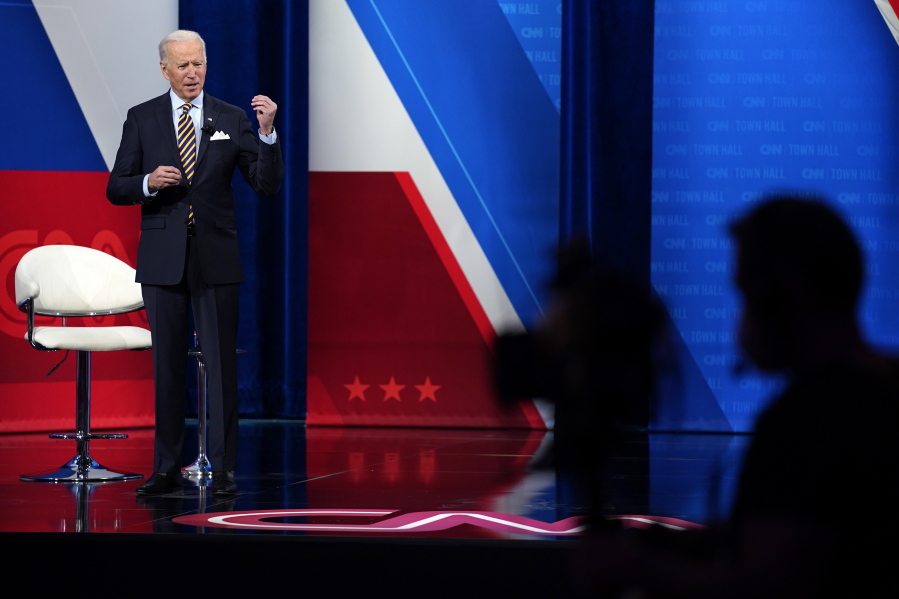 President Joe Biden talks during a televised town hall event at Pabst Theater, Tuesday, Feb. 16, 2021, in Milwaukee.