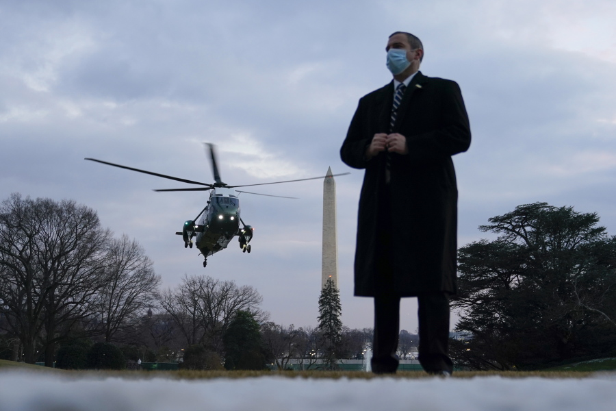Marine One, with President Joe Biden aboard, approaches the South Lawn of the White House, Friday, Feb. 19, 2021, in Washington. Biden is returning to Washington after visiting Pfizer&#039;s COVID-19 vaccine manufacturing site near Kalamazoo, Mich.
