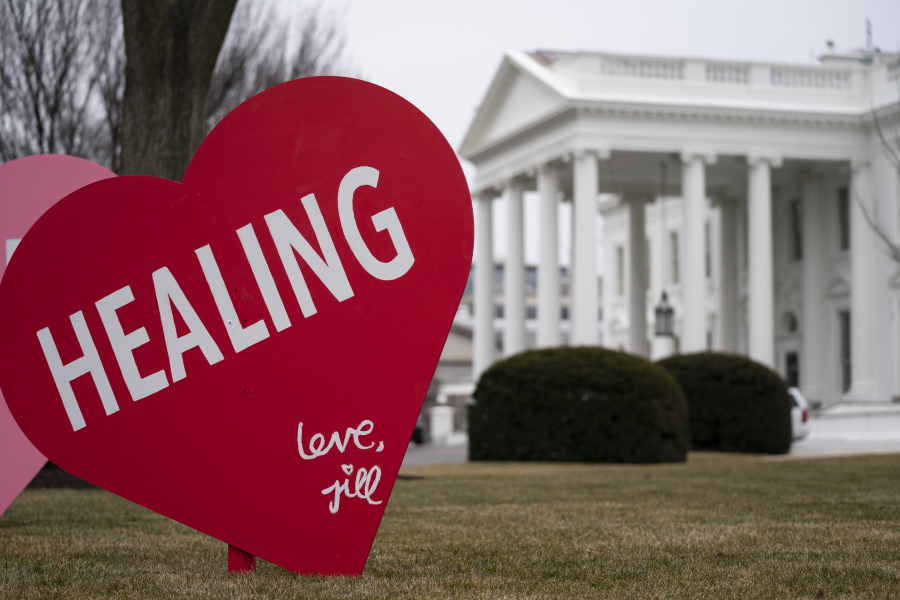 A Valentine&#039;s Day decoration, signed by first lady Jill Biden, sits on the North Lawn of the White House, Friday, Feb. 12, 2021, in Washington.