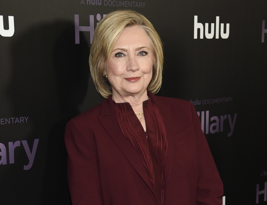 FILE - Former secretary of state Hillary Clinton attends the premiere of the Hulu documentary &quot;Hillary&quot; in New York on March 4, 2020. Clinton is teaming up with her friend Louise Penny on the novel &quot;State of Terror,&quot; out Oct. 12, 2021.