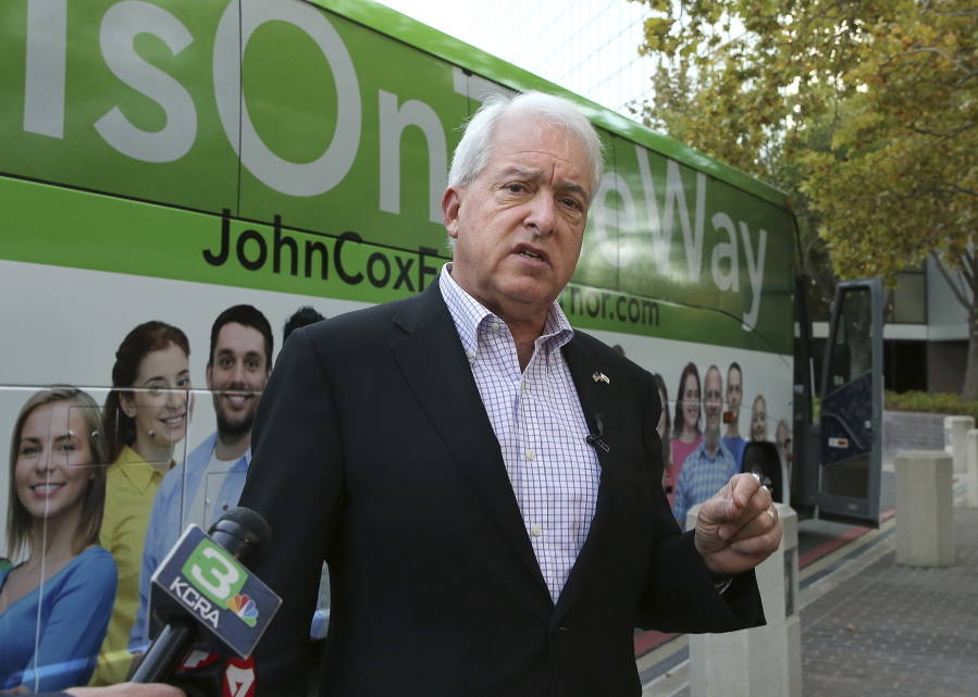 FILE - In this Nov. 1, 2018, file photo, Republican gubernatorial candidate John Cox talks to reporters before beginning a statewide bus tour in Sacramento, Calif. California Gov. Gavin Newsom is facing a possible recall election as the nation&#039;s most populous state struggles to emerge from the coronavirus crisis. Newsom&#039;s challenging year has already encouraged Republicans who have signaled they are likely candidates, including former San Diego Mayor Kevin Faulconer and Newsom&#039;s 2018 rival, businessman Cox.