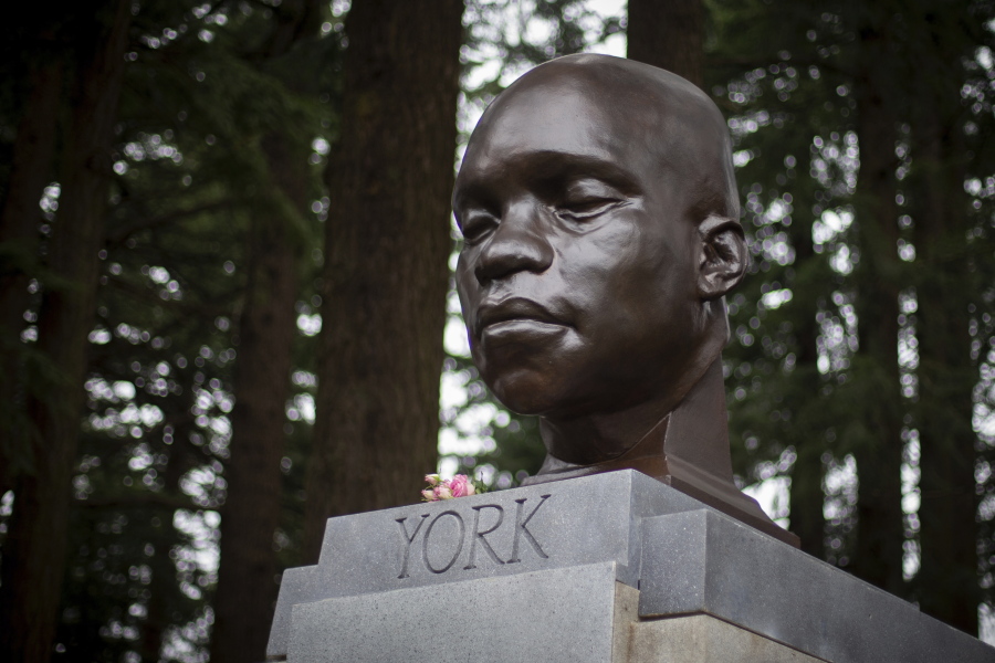 A bust of York, a member of the Lewis and Clark expedition, is seen on Mount Tabor in southeast Portland, Ore., on Sunday Feb. 21, 2021. The statue appeared the day before.