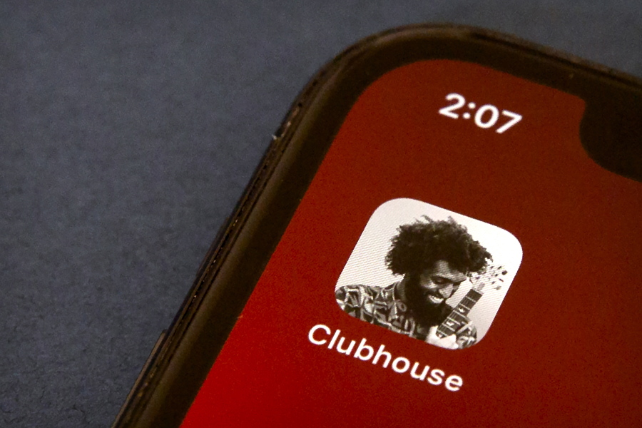 The icon for the social media app Clubhouse is seen on a smartphone screen in Beijing, Tuesday, Feb. 9, 2021. Clubhouse, an invitation-only audio chat app launched less than a year ago, has caught the attention of tech industry bigshots like Tesla CEO Elon Musk and Facebook CEO Mark Zuckerberg, not to mention the Chinese government, which has already blocked it in the country.