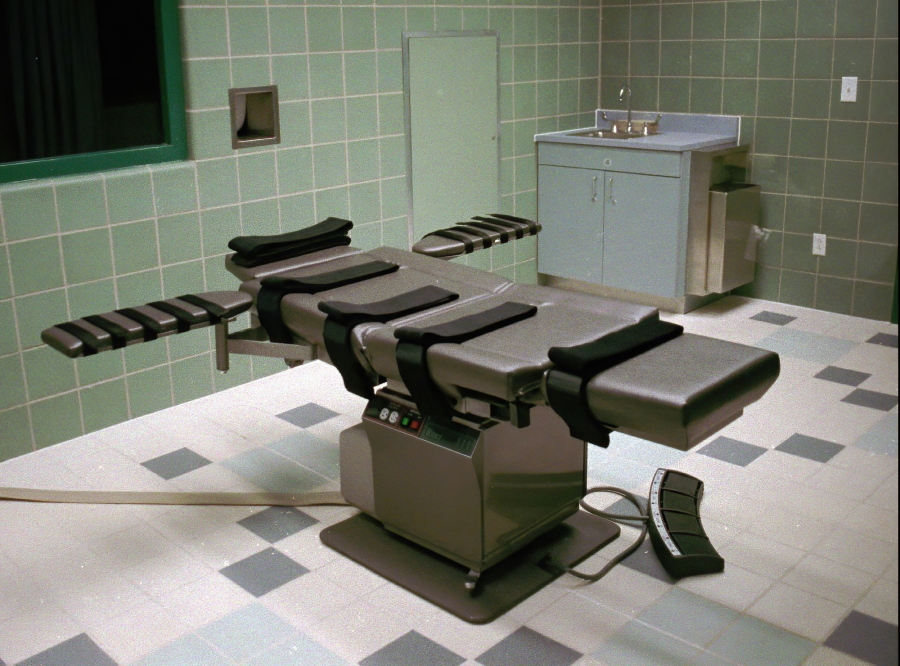 FILE - This March 22, 1995, file photo shows the interior of the execution chamber in the U.S. Penitentiary in Terre Haute, Ind. Executioners who put 13 inmates to death in the last months of the Trump administration likened the process of dying by lethal injection to falling asleep, called gurneys &quot;beds&quot; and final breaths &quot;snores.&quot; But those tranquil accounts are at odds with AP and other media-witness reports of how prisoners&#039; stomachs rolled, shook and shuddered as the pentobarbital took effect inside the U.S. penitentiary death chamber in Terre Haute, Indiana.