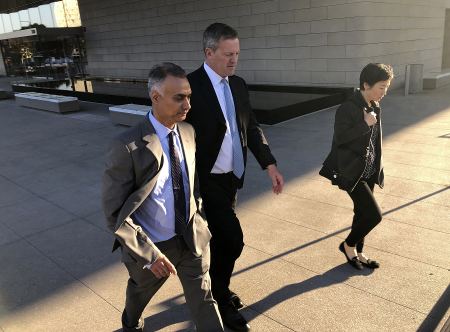 FILE - In this Friday, Nov. 22, 2019 file photo, Imaad Zuberi, left, leaves a federal courthouse with his attorney Thomas O&#039;Brien, second from left, in Los Angeles. On Thursday, Feb. 18, 2021, Zuberi, a once high-flying political fundraiser who prosecutors say gave illegal campaign contributions to Joe Biden, Lindsey Graham and a host of other U.S. politicians while secretly working for foreign governments is set to be sentenced.