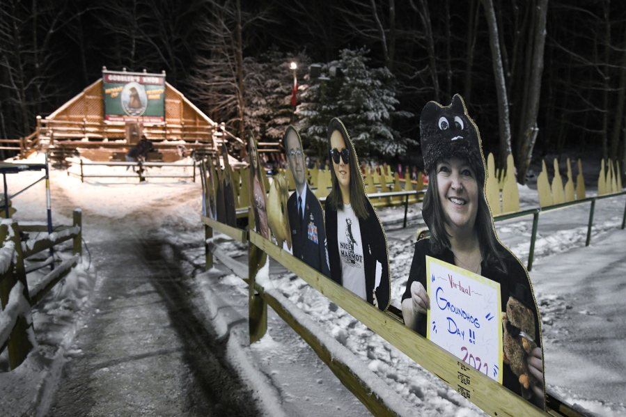 Cardboard cutouts of groundhog enthusiasts decorate Gobbler&#039;s Knob for the 135th celebration of Groundhog Day in Punxsutawney, Pa., Tuesday, Feb. 2, 2021. This year&#039;s event was held without anyone in attendance due to potential COVID-19 risks.