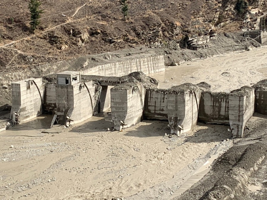 The remains of Tapovan Hydro-Electric Power Dam that was swept away in Sunday&#039;s devastating flood are seen Tuesday in the northern state of Uttarakhand, India. (rishabh r.