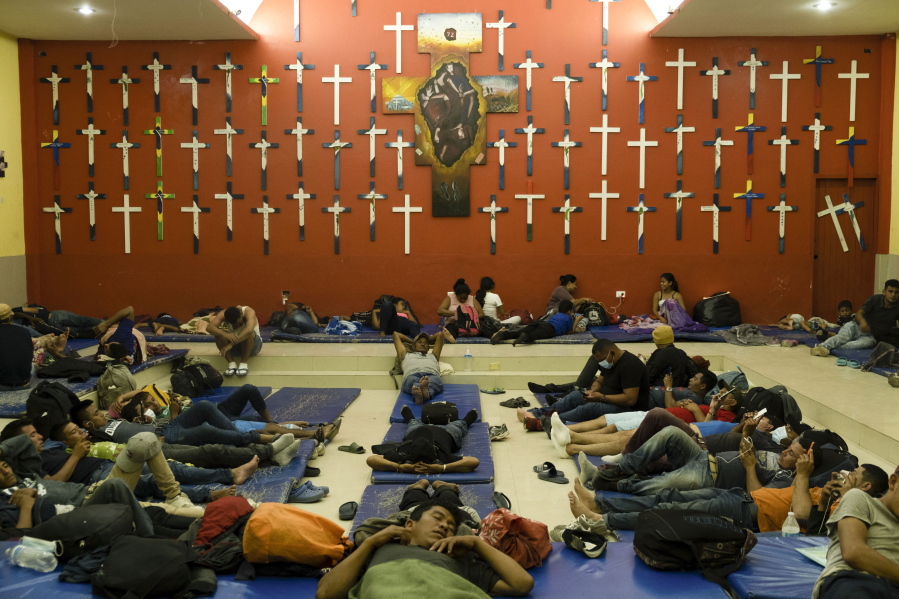 Central American migrants rest at &quot;The 72&quot; shelter in Tenosique, Tabasco state, Mexico, Tuesday, Feb. 9, 2021. Only six weeks into the year, the shelter has hosted nearly 1,500 migrants compared to 3,000 all of last year, even though it has halved its dormitory capacity due to the new cornavirus pandemic.